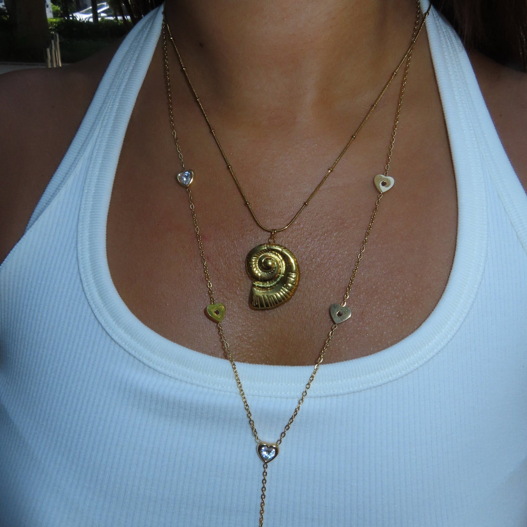 Shell necklace - 𝐇𝐨𝐧𝐞𝐲 𝐁𝐮𝐭𝐭𝐞𝐫 𝐍𝐢𝐧𝐞